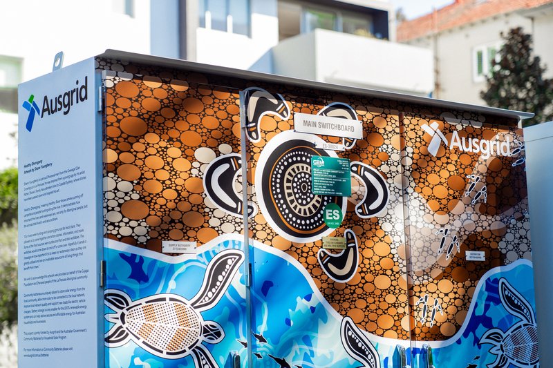 Ausgrid community battery in Bondi with colourful artwork on its cabinet