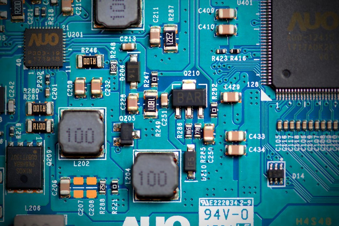 Close-up of electronic components on a circuit board, shown for illustration.