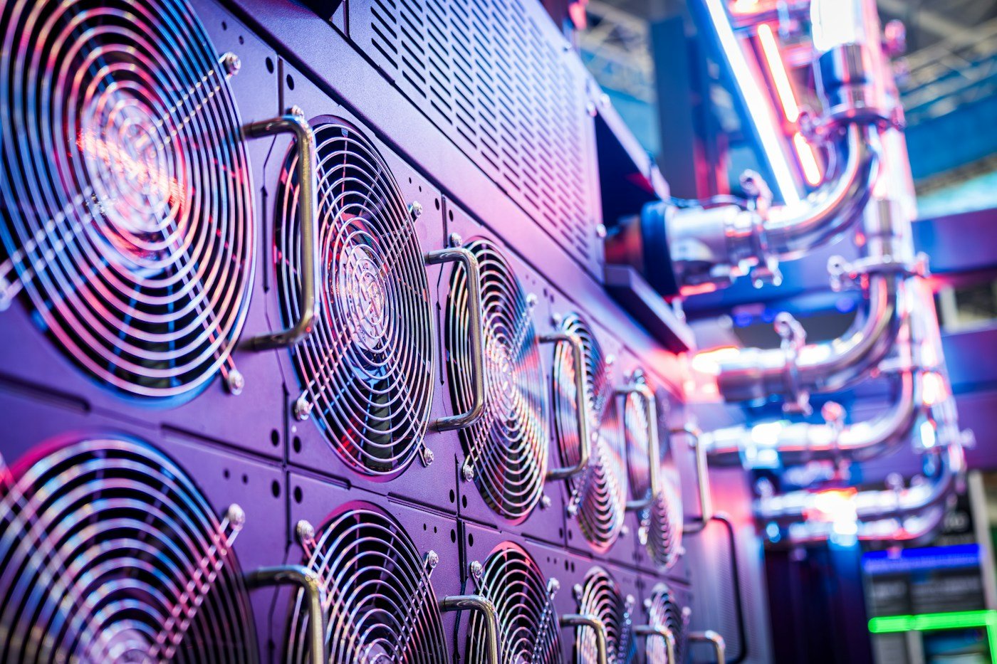 Rows of cooling fans and pipes in computing equipment