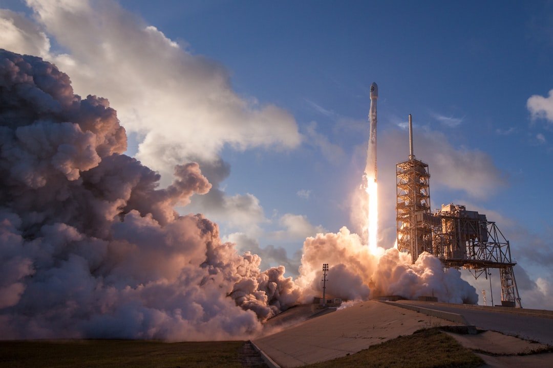 Falcon 9 lifting off in an archive SpaceX photograph.