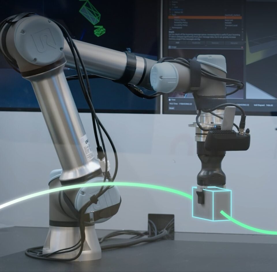Intrinsic robot machine-tending example presented at ROSCon