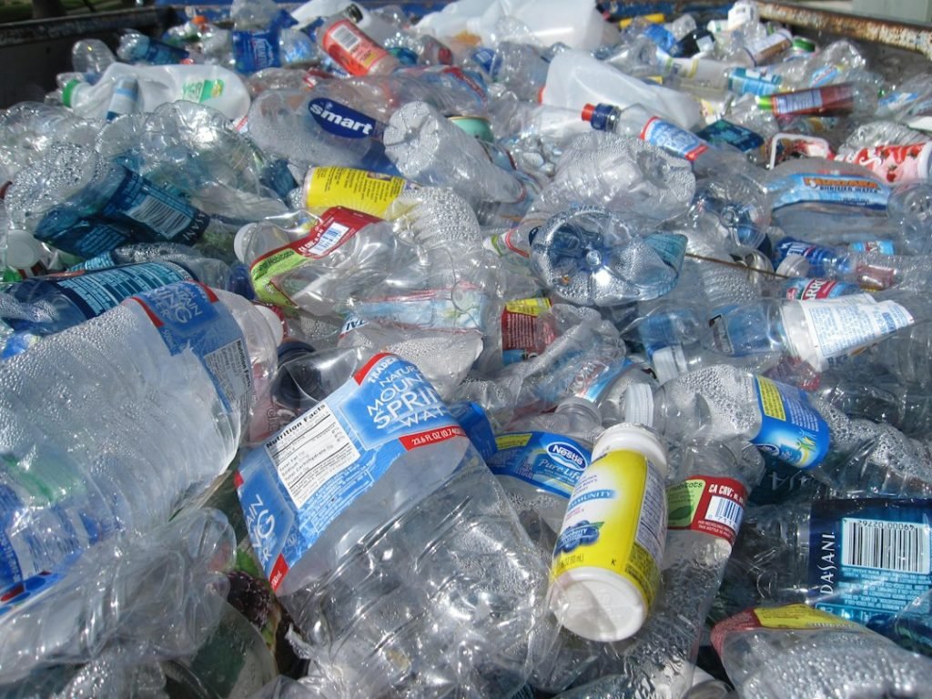 Pile of used plastic drinks bottles