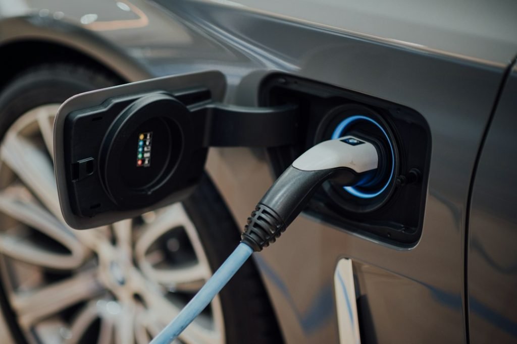 A charging cable connected to an electric vehicle