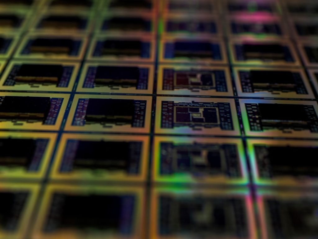 Close-up of a prototype silicon wafer with patterned chips.