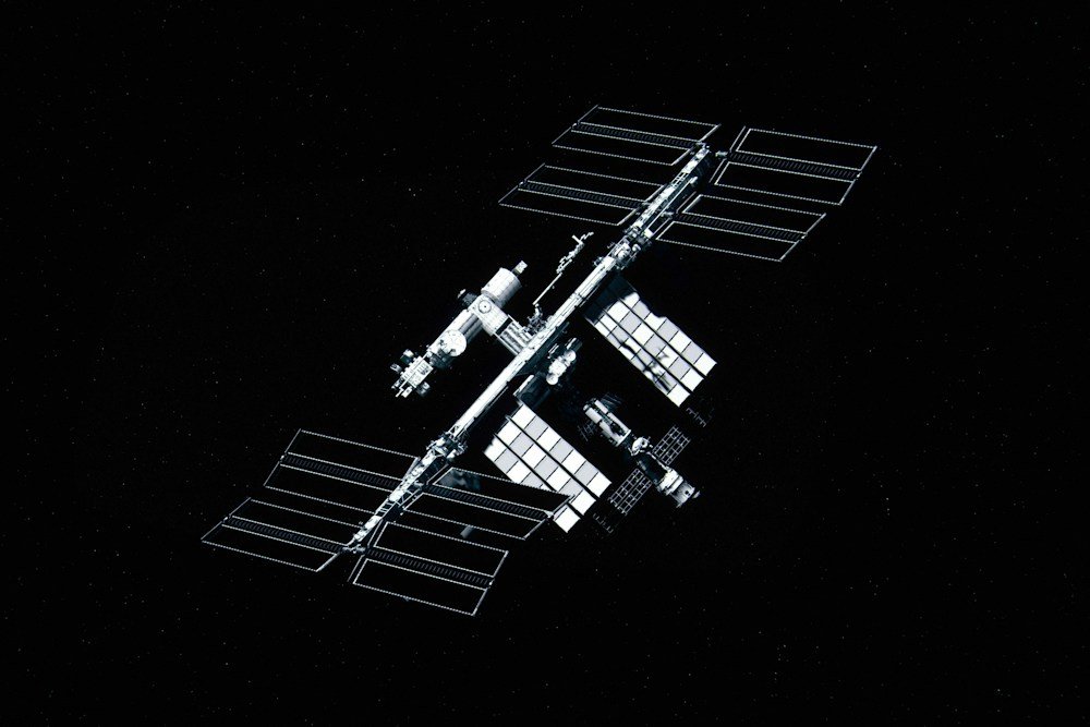 International Space Station with extended solar arrays