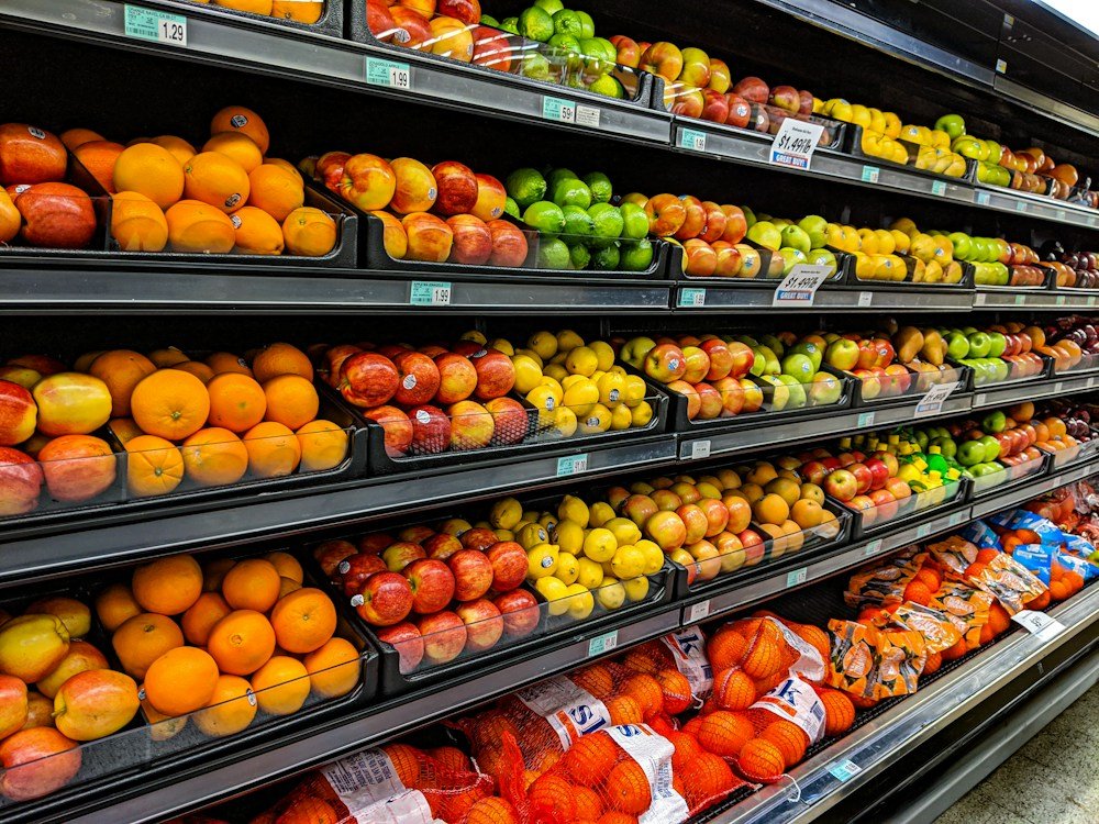 Rows of fresh fruit displayed in a supermarket