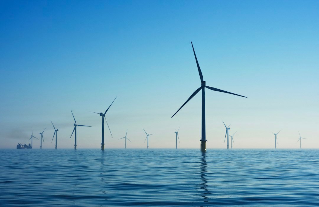 Wind turbines across open countryside; representative photograph.