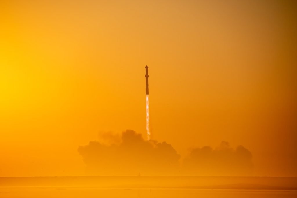 Rocket ascending above a cloud of exhaust