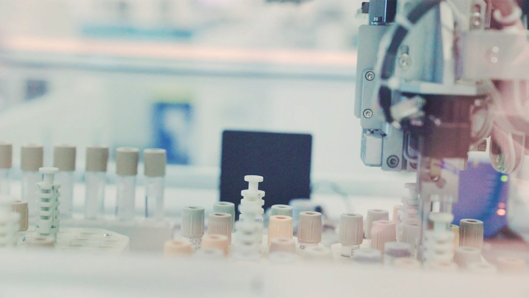Automated laboratory equipment processing biological samples