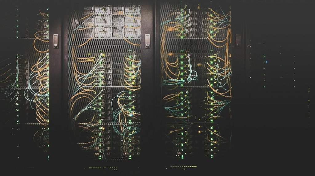 Network cabling in a data centre representing cloud AI infrastructure; not Vultr's planned Chennai cluster.