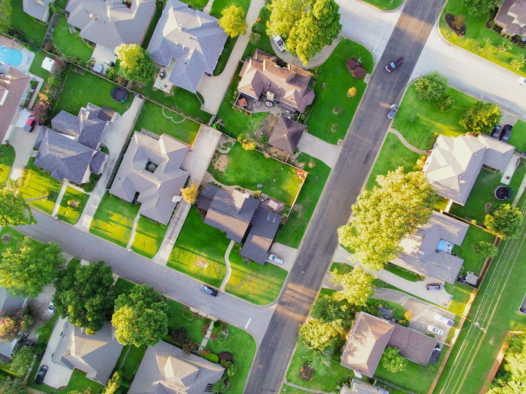 Aerial view of a suburban neighbourhood, illustrating communities affected by infrastructure decisions