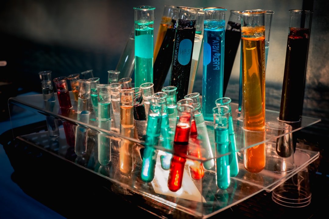 Laboratory tubes containing coloured liquids
