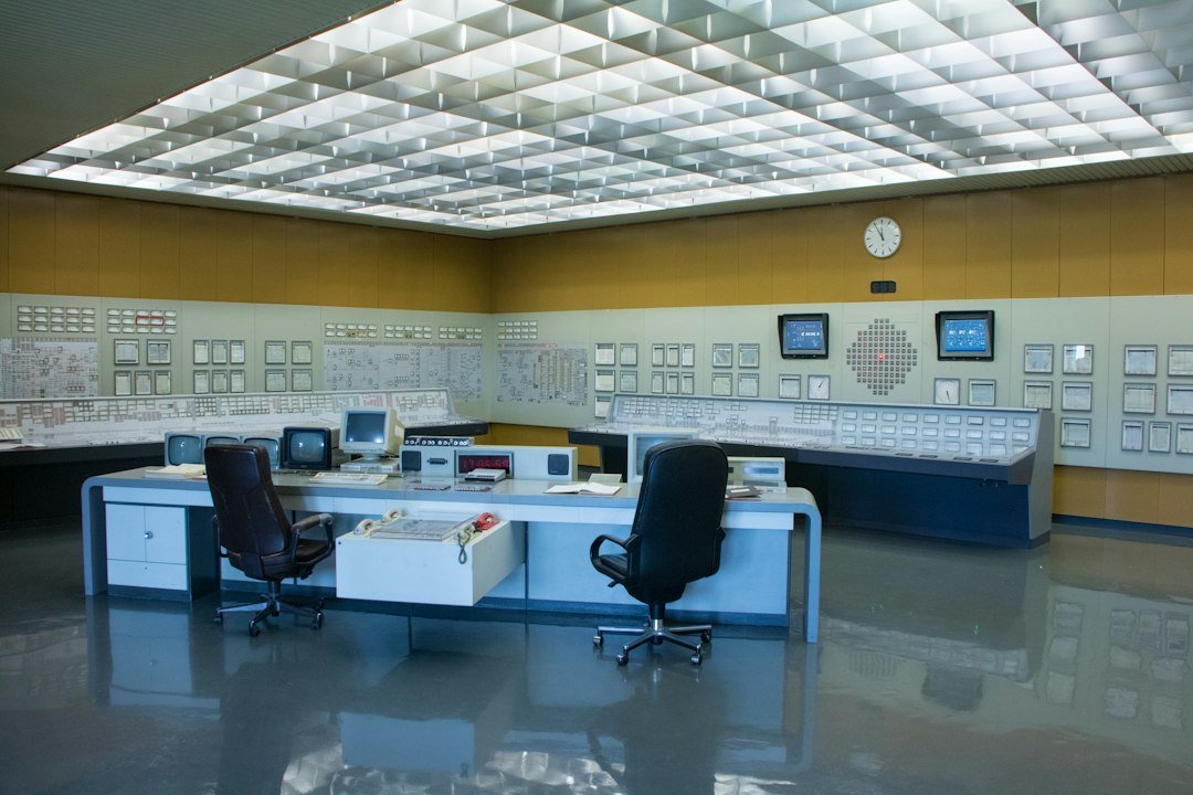Industrial control room with monitoring panels